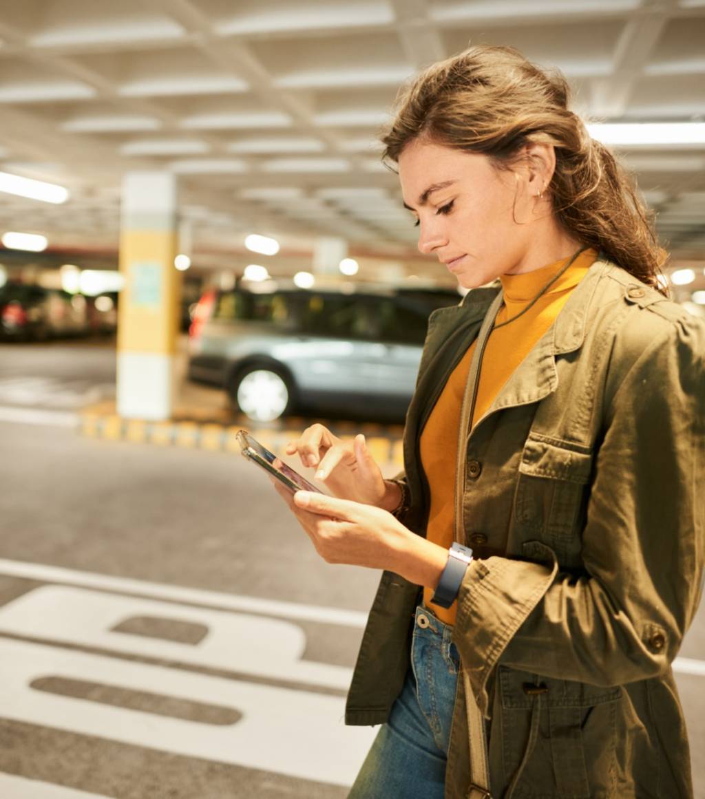 Person paying at a pump with Waylet