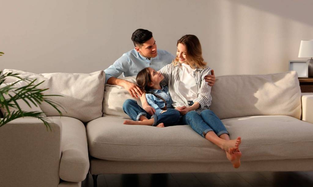 Family sitting on a couch