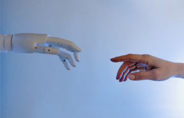 Robotic hand reaching for a human hand